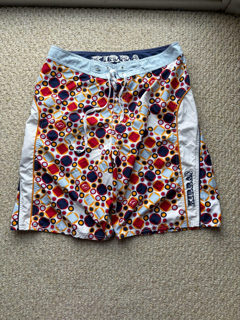 Y2K Kirra White Geometric Print Mens swim Shorts with Red navy & Yellow Accents